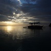 boat on water under dark skies