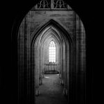 old architecture dark hallway with columns